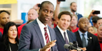 Florida Surgeon General Dr. Joseph Ladapo speaks to supporters and members of the media before a bill signing by Gov. Ron DeSantis on Nov. 18, 2021, in Brandon, Fla.