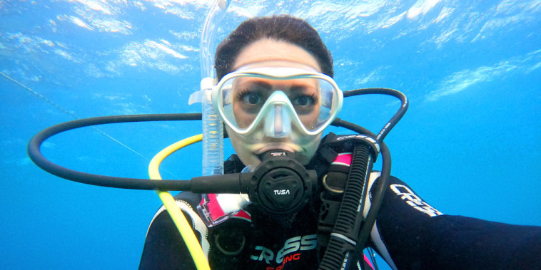 Andi Cross is an expedition lead, growth strategist, divemaster, founder of impact consultancy WILDPALM.