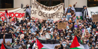 Protesters at Harvard University show their support for Palestinians in Gaza at a rally in Cambridge, Mass., on Oct. 14, 2023.